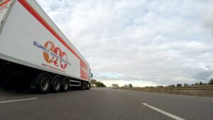 HGV truck driving on road