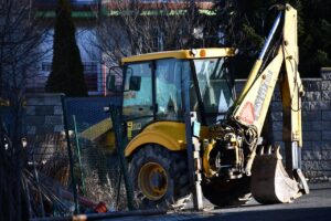 digger outside construction site